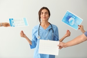 Female nurse meditating and staying calm